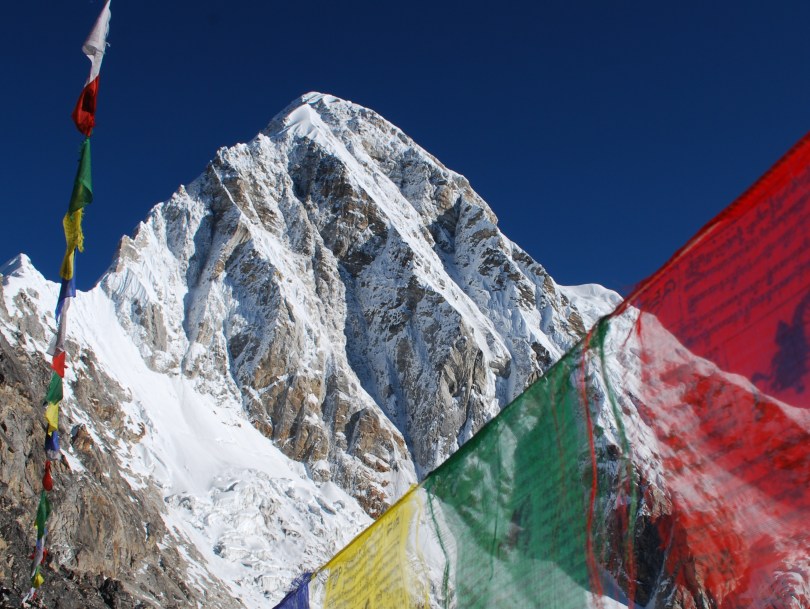 Nepalese mountain view and prayer flags